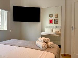 Moderno e Aconchegante a 3 min a pé da Praia, Espaço para Relaxar, Lava e Seca