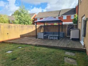 Spacious 3-Bed Home with Private Gym & Garden