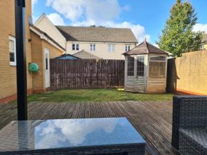 Spacious 3-Bed Home with Private Gym & Garden