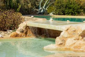 Rock Waterfall Rustic House