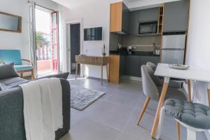 Faro- Exclusive Historic Center Loft with Mezzanine & Private Balcony