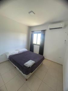 Departamentos frente al shopping