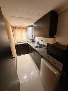 Departamento Centrico con piscina, gimansio y sauna