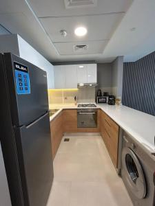 Chic 1 Bhk Retreat in Radiant Viewz, Al Reem