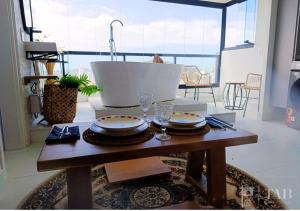 Loft Good Vibes - Banheira Vista Mar