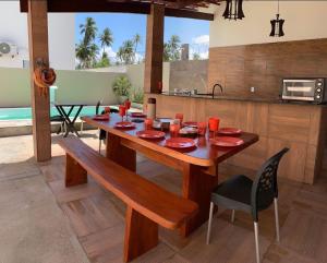 Casa 4 quartos condomínio frente mar com piscina e area gourmet