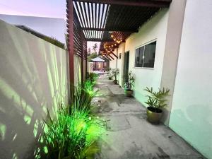 Casa 4 quartos condomínio frente mar com piscina e area gourmet