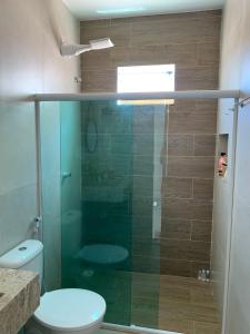 Casa 4 quartos condomínio frente mar com piscina e area gourmet