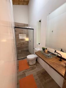 Falésia House Cumuruxatiba - pé na areia