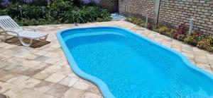 Casa com Piscina 250 m Mar 4 Quartos