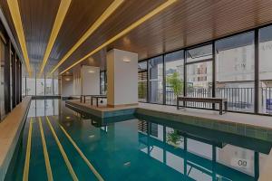 Essenza Elysia · Studio com piscina-centro