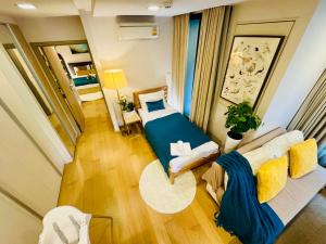 Cozy Spacious 1BR 2Bed GardenView 500m BTS Thonglo, Samitivej, SKV49, Rooftop Pool, Fast 500mbps wifi