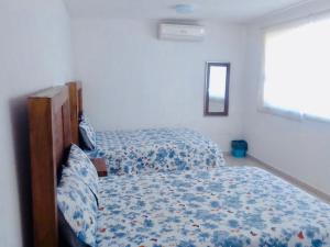 CASA HUELLAS EN LA ARENA