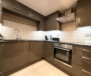 Riverside city-centre apartment with parking