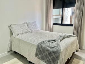 Lindo! Apto com piscina na Praia de Palmas. DK02J