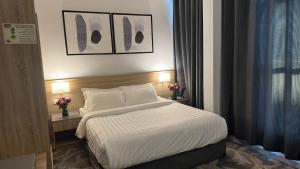 Laten Suites Al Salim Plaza