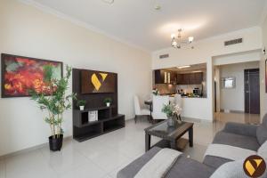 Vogue Vacation Homes, Arjan Siraj Tower near Miracle Garden and Dubai Hills Mall, One Bedroom Apartment with Large Balcony and City View, Access toAmenities