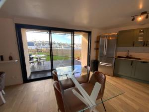 Appartement avec son jardin face au port dAudierne