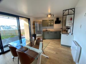 Appartement avec son jardin face au port dAudierne