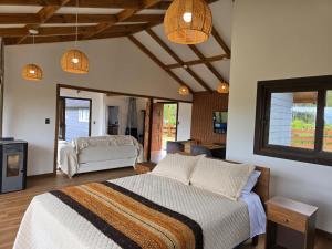 HOM I Cabaña La Ensenada vista parcial al Volcán