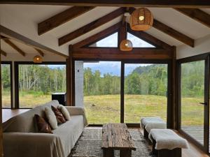 HOM I Cabaña La Ensenada vista parcial al Volcán