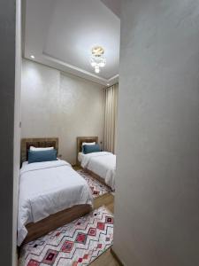 Appartement 3 chambres avec piscine, proche de la plage Zenâta Eco City