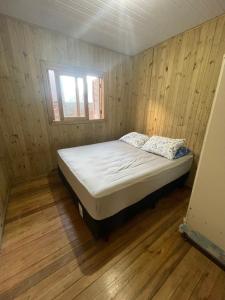 Casa pé na areia em capão da canoa