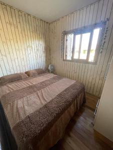 Casa pé na areia em capão da canoa