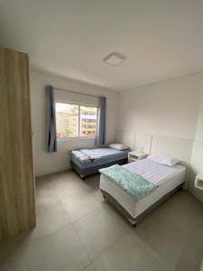 Amplo e aconchegante apartamento a 4 min do mar
