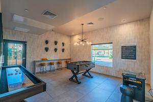 Steps from Stadium with Balcony Pool Gym Parking WD