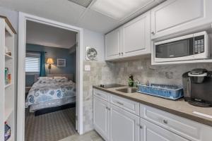 9103 Atlantic Ave, Unit 207