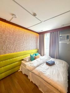 House of Keul - 2BR cozy condo in Dumaguete with pool and free laundry for long term guests up to 4 pax