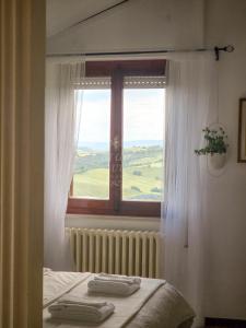 La dolce vita - 10 min da A1 autostrada, terrazza sul tramonto , vista panoramica sulle colline