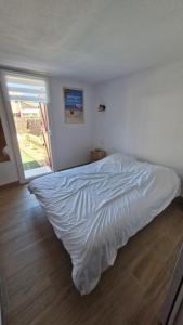 Maison proche plage et port - 3 chambres - grand jardin - clim