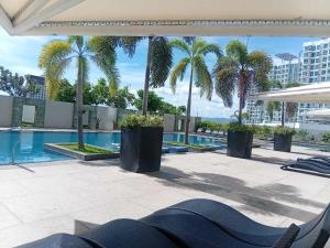 Mactan Newtown Condo with Pool access