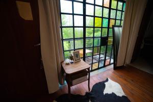 Habitación doble con balcón y pileta en las sierras Unquillo