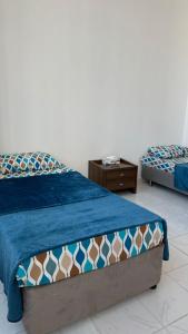 Single bed in al Majaz 2 - سوبر ديلوكس سرير مفرد في شقة فندقية