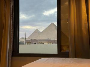 Zahira Pyramids View