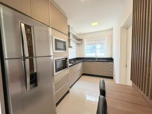 Achei Itapema • Lazer completo conforto c 3suítes