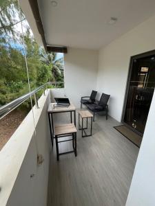 Nayuha Apt A1 - 3 bed rooms - Reach for the beach, across the road
