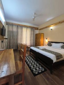 Tirthan Grand Riverside