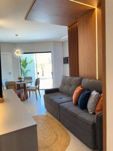 Apartamento moderno, a 200 metros da praia com pátio,piscina e churrasqueira privativa 2 vagas de garagem