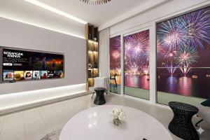 Luxurious 4BR La Vie JBR Private Beach Pool Panoramic Sea and Dubai Eye Views Drone Show Perfect for Family and Friends