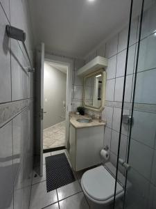 Apartamento a 60m da praia com ar-condicionado