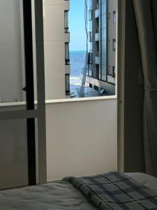 Apartamento a 60m da praia com ar-condicionado