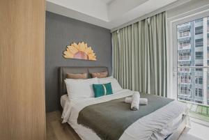 Lovely & Spacious 2BR Home near Solaire & Okada