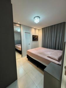 Meia Praia - 5 min to Russi Shopping