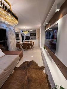 Apartamento 3 suítes vista do mar Com 2 Garagem