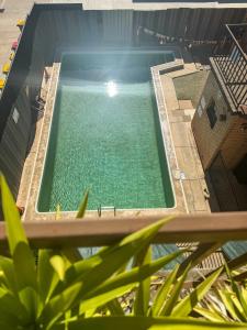 DEIA at #10 - Pool, City Views, 75inch TV, Wifi