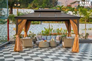 StayVista at Saya Infinity with Pool, Lawn